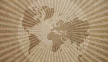 Vintage globe on rays background