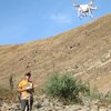 photo of Kasia Kasia Szremski flying a drone at field school in Peru